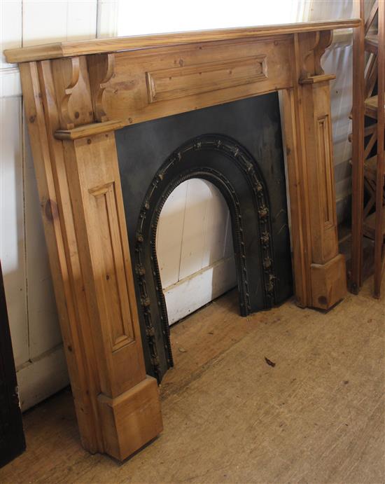 Pine fire surround with cast iron insert